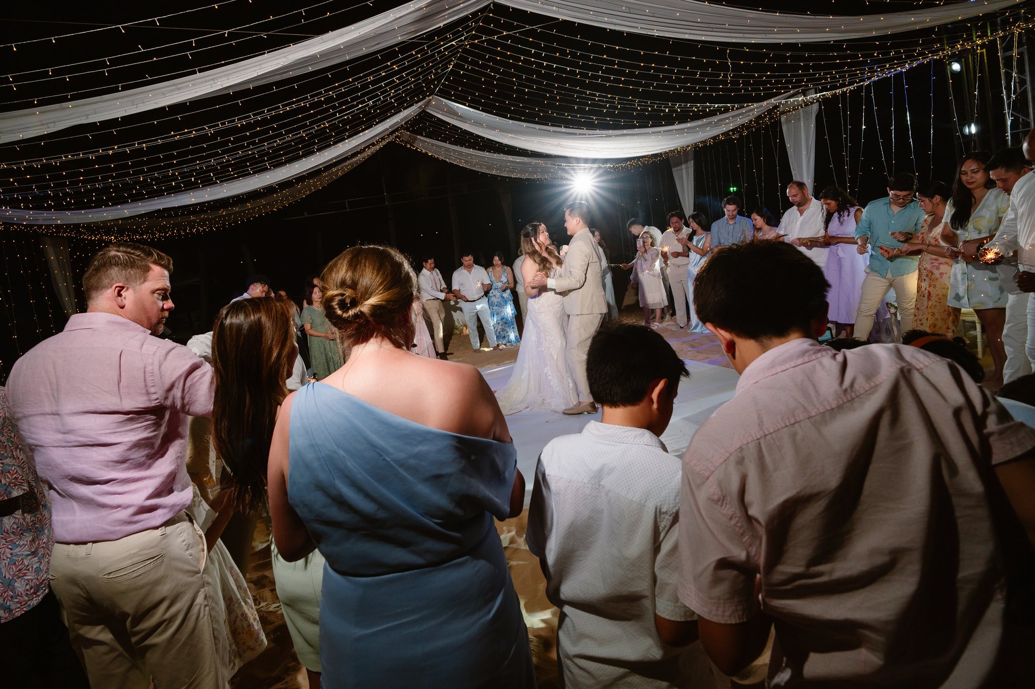 First dance under the lights at a Phu Quoc beach wedding reception