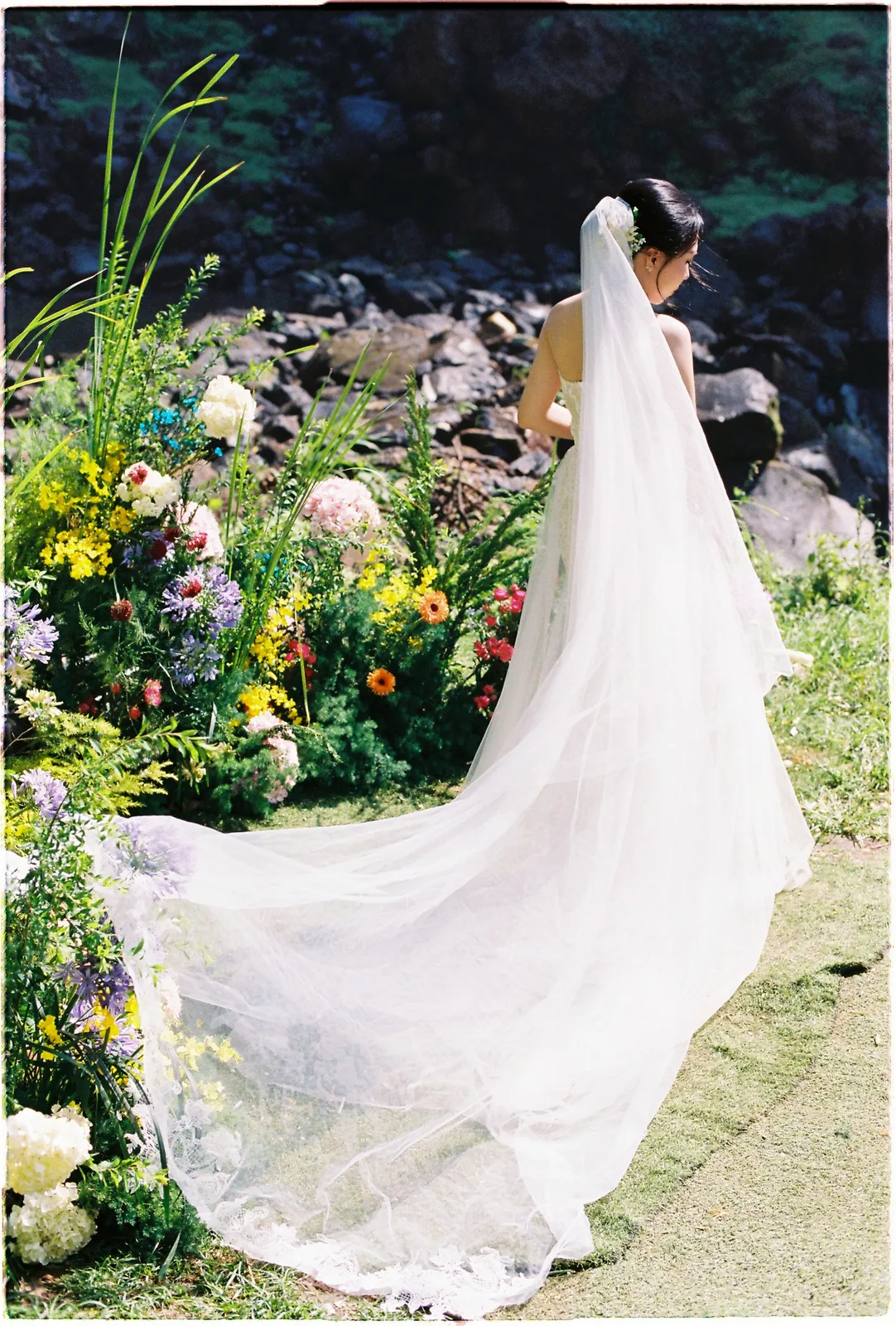 A misty sunrise vow ceremony at Suối Tía, just outside Da Lat, captured on 35mm film.